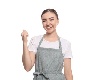 Beautiful young woman in clean apron on white background