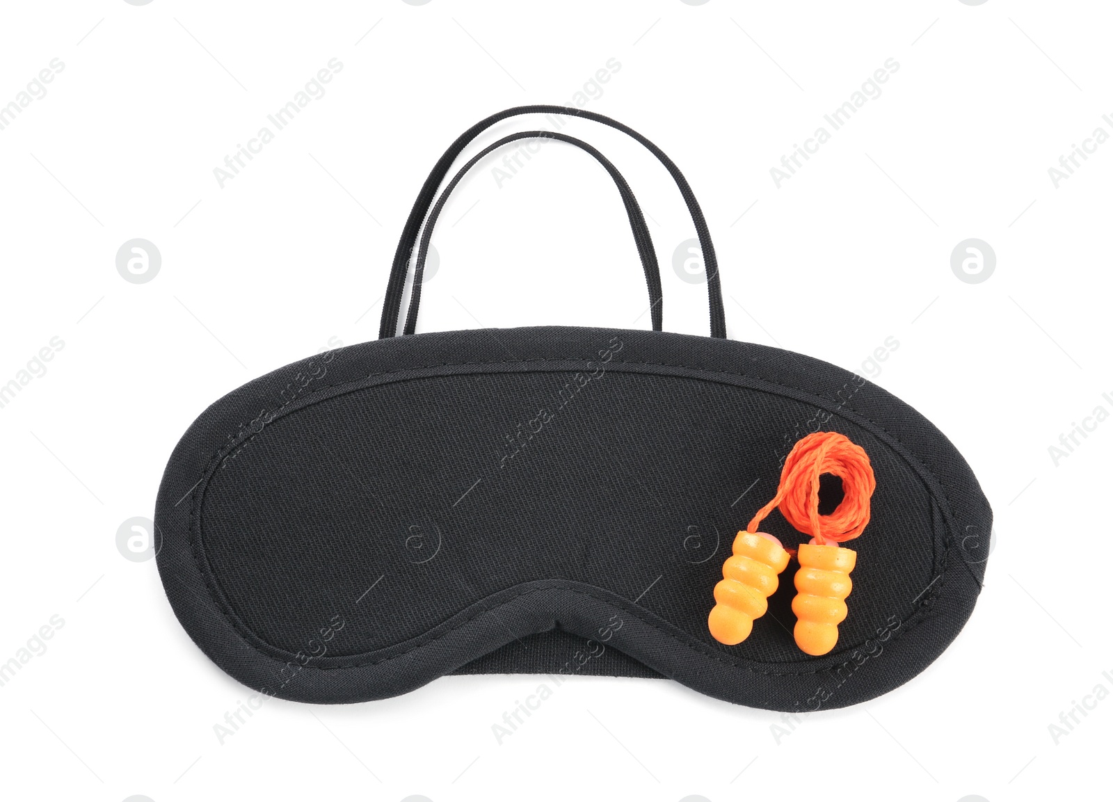 Photo of Pair of ear plugs and black sleeping mask on white background, top view