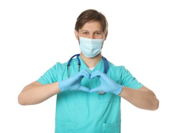 Photo of Doctor or medical assistant (male nurse) making heart with hands on white background