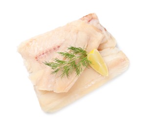 Photo of Pieces of raw cod fish, dill and lemon isolated on white