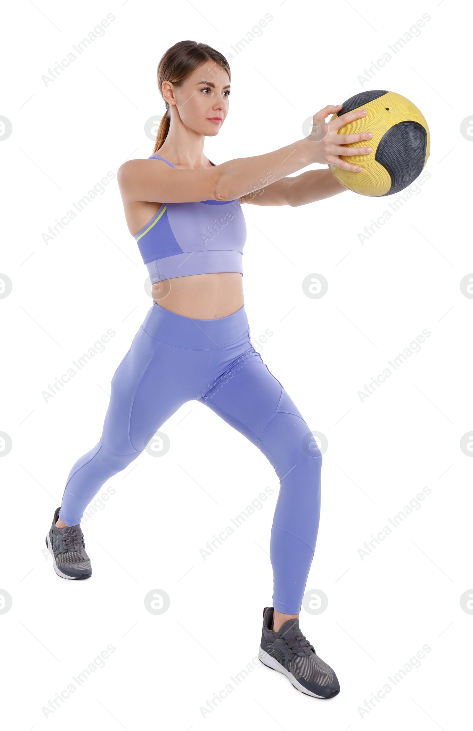 Photo of Athletic woman doing exercise with medicine ball isolated on white