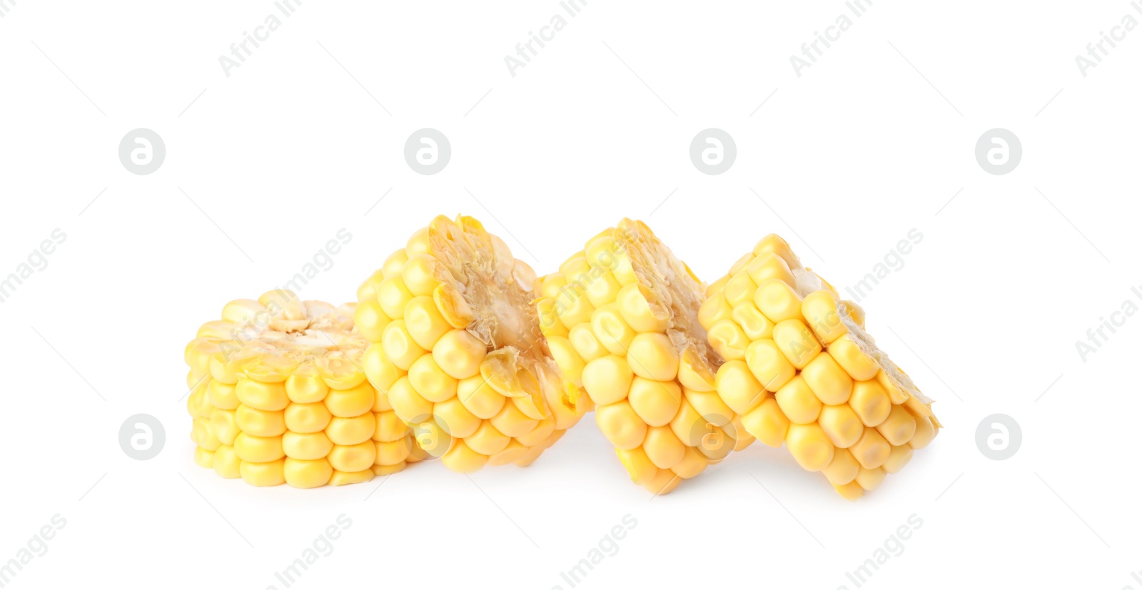 Photo of Pieces of ripe raw corn cob on white background