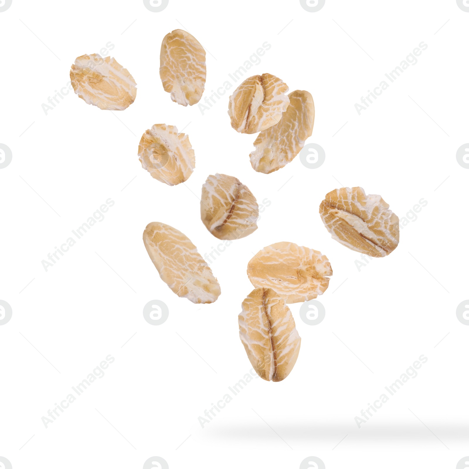 Image of Rolled oat flakes falling on white background