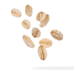 Image of Rolled oat flakes falling on white background