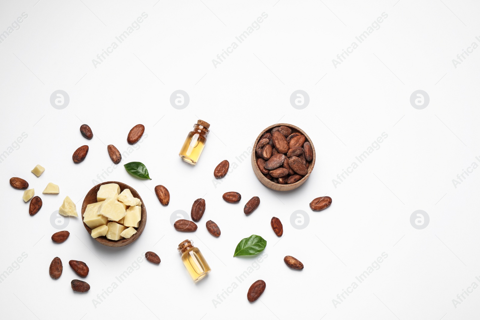 Photo of Composition with organic cocoa butter on white background, top view