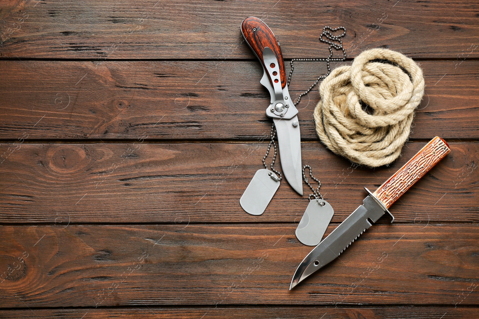 Photo of Set of military outfit on wooden background