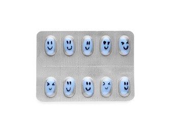 Photo of Blister of antidepressant pills with emotional faces on white background, top view