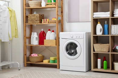 Laundry room interior with washing machine and furniture