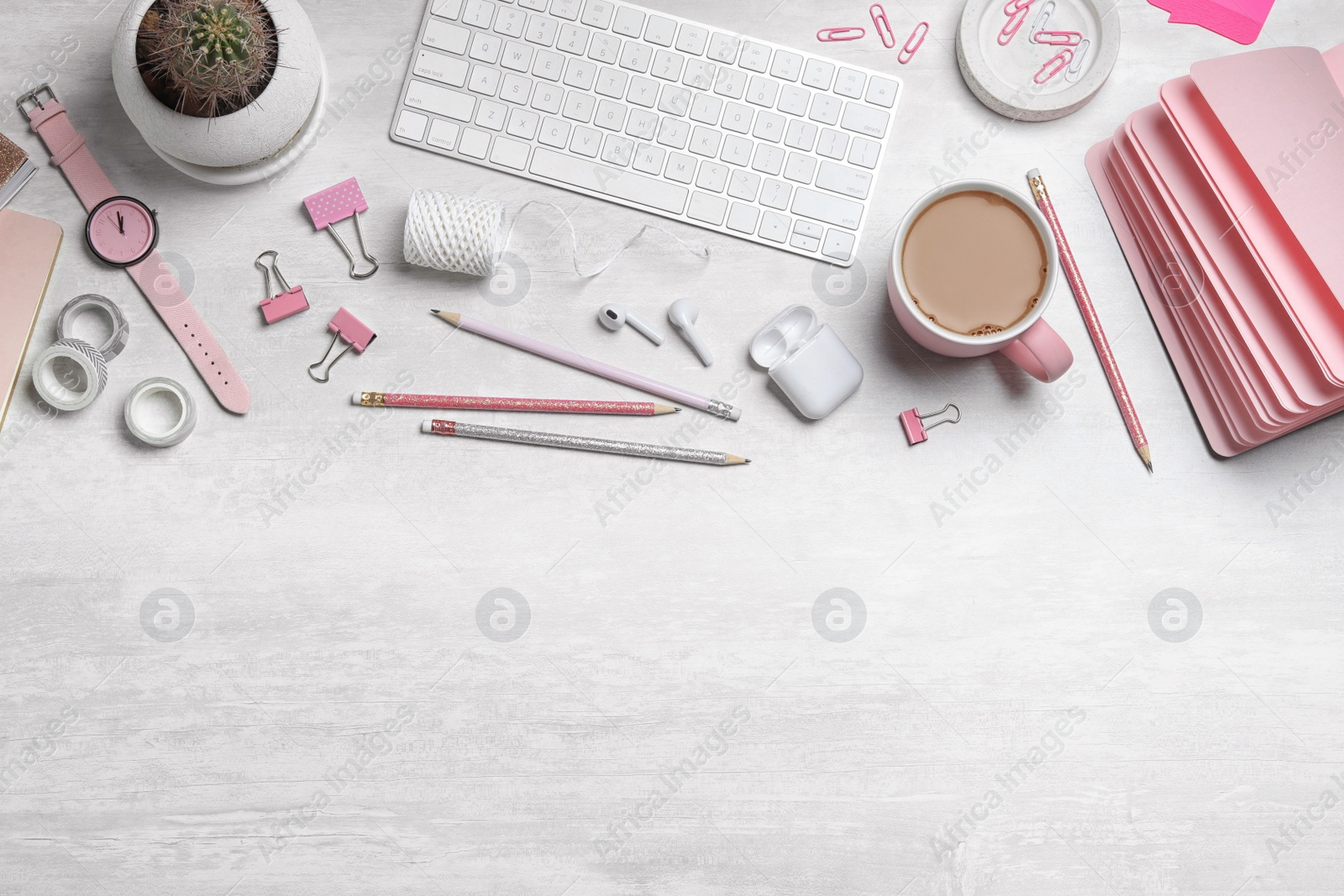 Photo of Flat lay composition with keyboard, stationery and accessories on white table, space for text. Designer's workplace