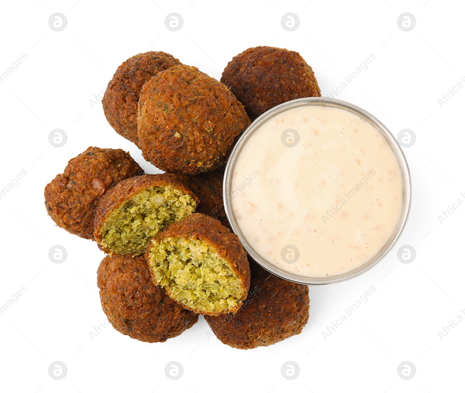 Photo of Delicious falafel balls and sauce isolated on white, top view