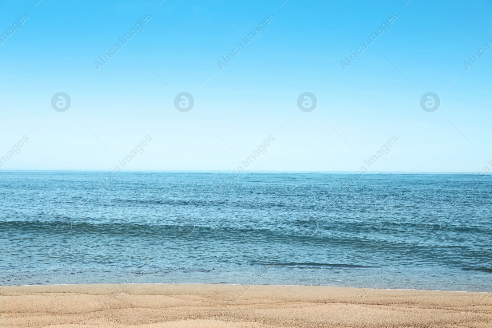 Photo of Picturesque view of sandy beach near sea