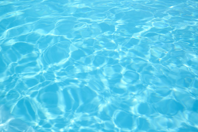Photo of Swimming pool with clean water as background, closeup