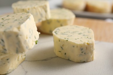 Photo of Tasty butter with dill on table, closeup