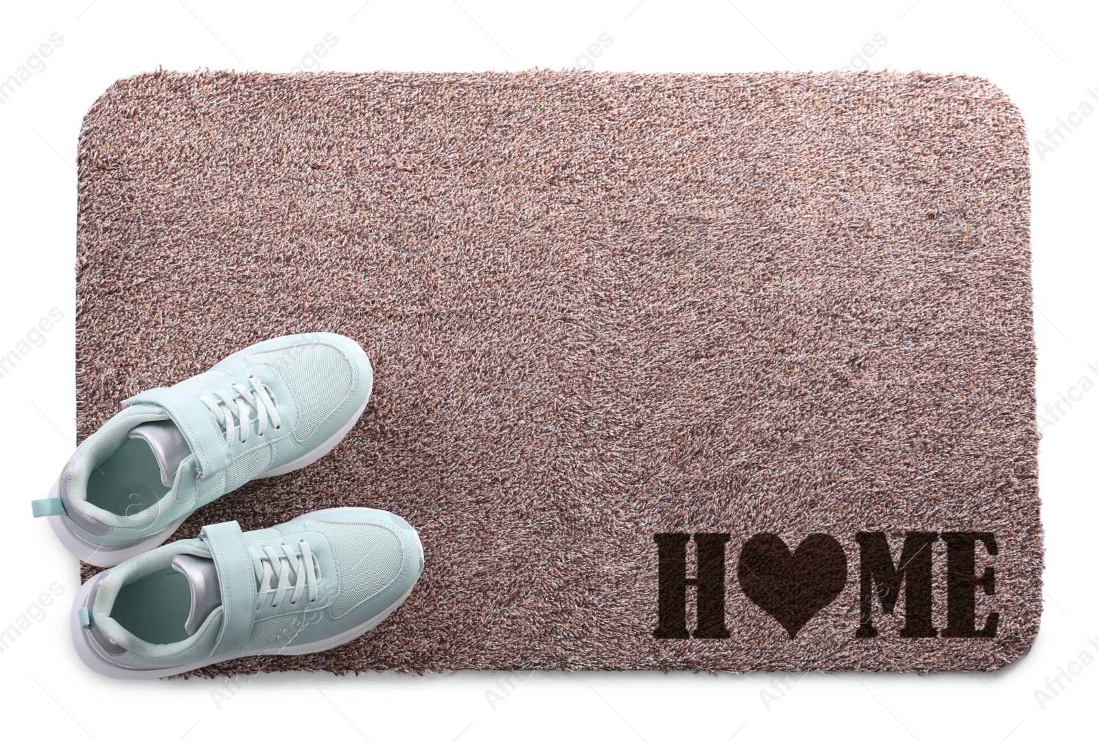 Image of Door mat with words Home and shoes on white background, top view