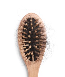 Photo of Wooden brush with lost hair on white background, top view
