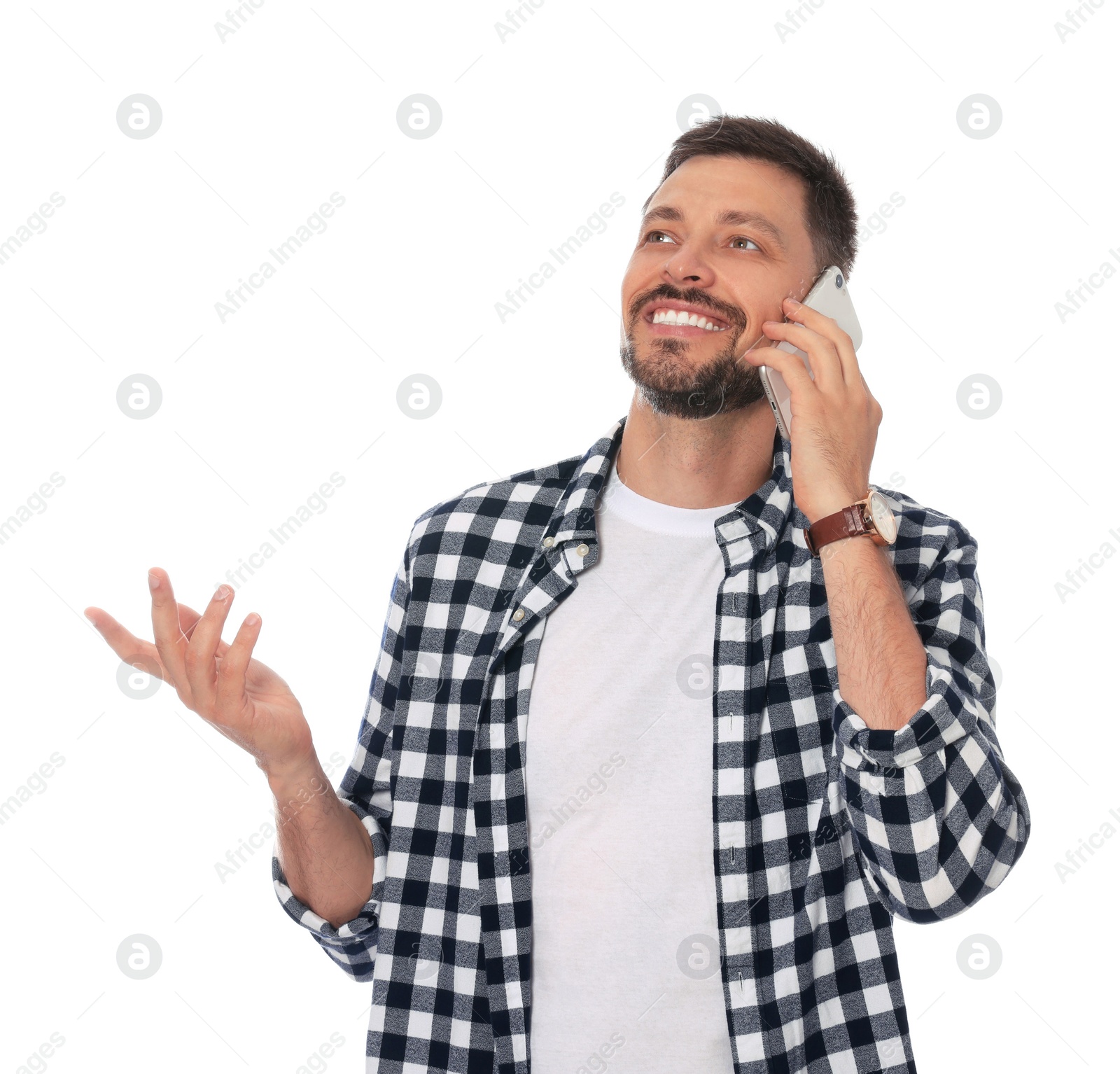 Photo of Handsome man talking on smartphone against white background