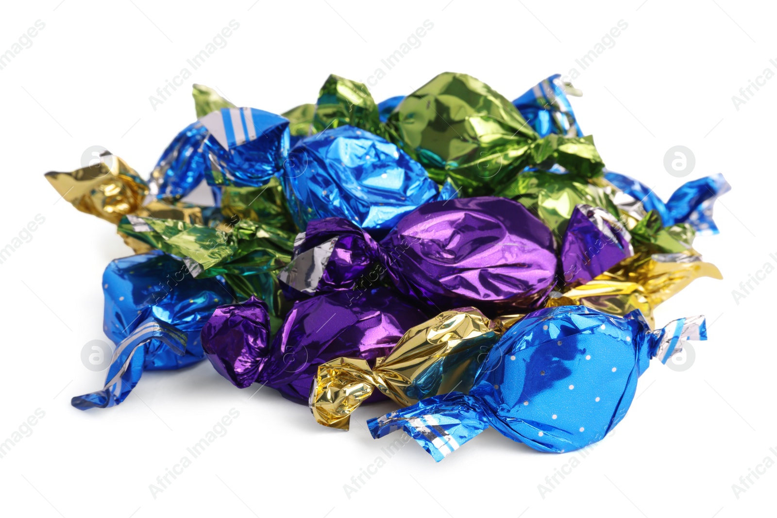 Photo of Candies in colorful wrappers isolated on white