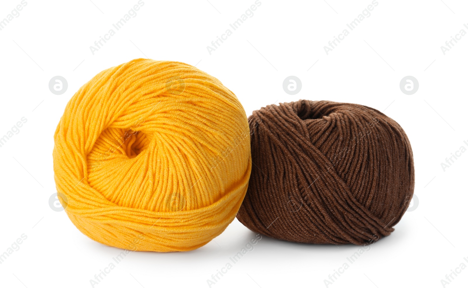 Photo of Soft colorful woolen yarns on white background