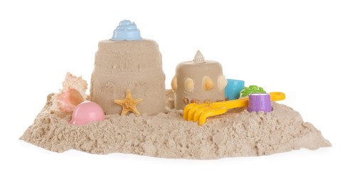 Plastic beach toys and figures on pile of sand against white background. Outdoor play