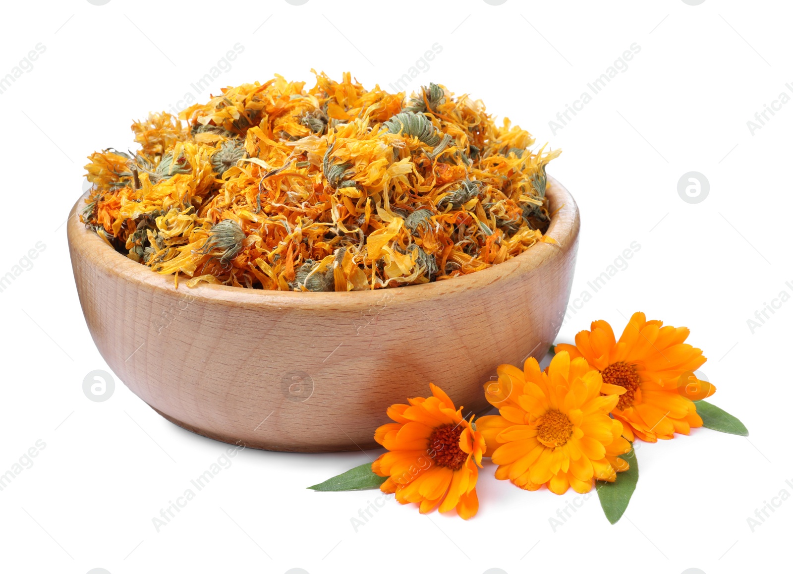 Photo of Wooden bowl with dry and fresh calendula flowers on white background