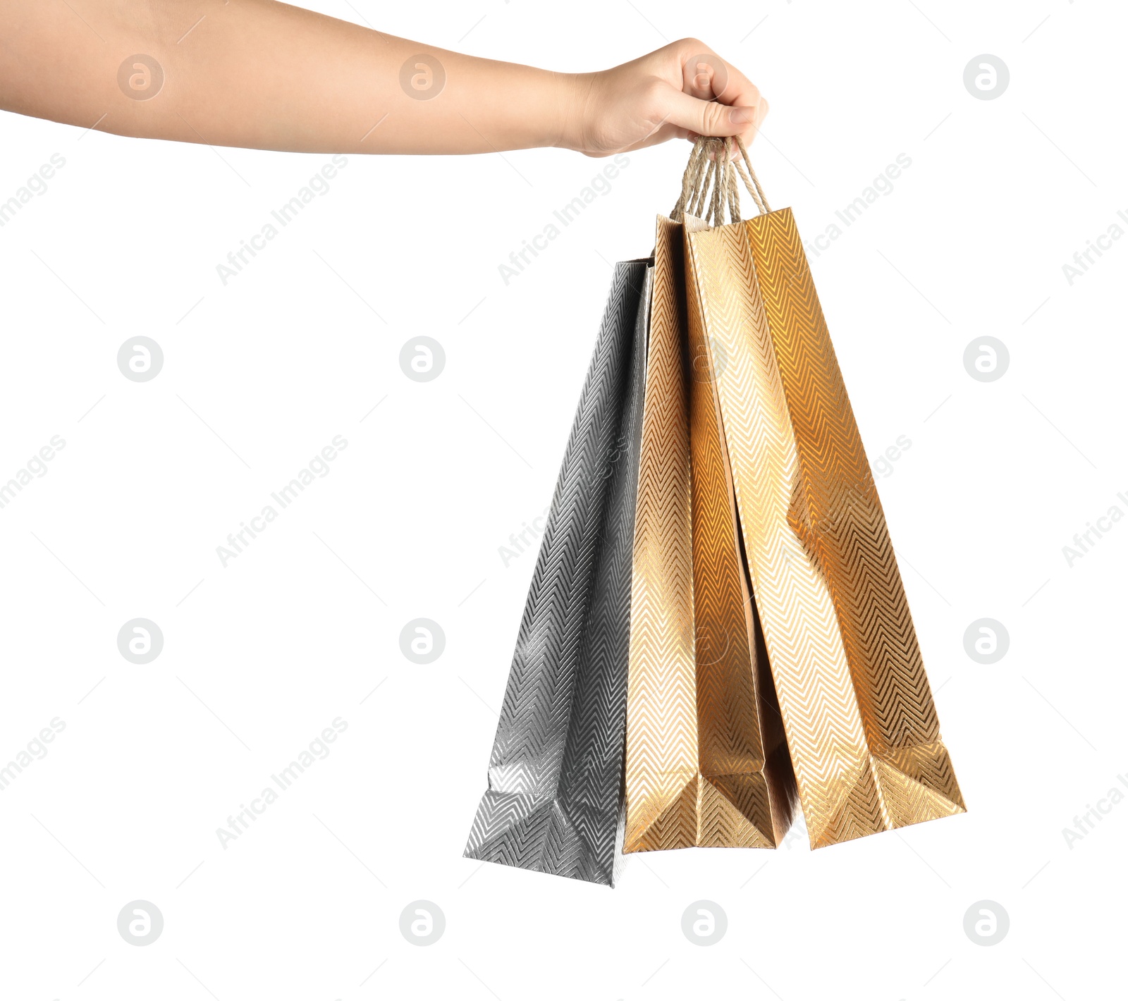 Photo of Woman holding paper shopping bags on white background, closeup