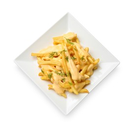 Delicious french fries with cheese sauce and dill isolated on white, top view