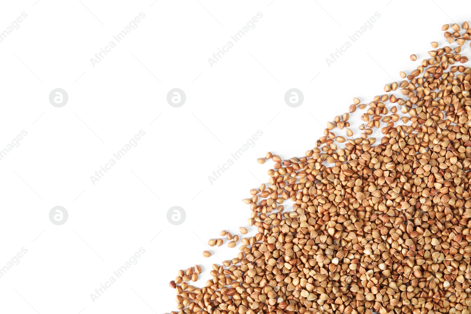 Photo of Uncooked buckwheat on white background, top view