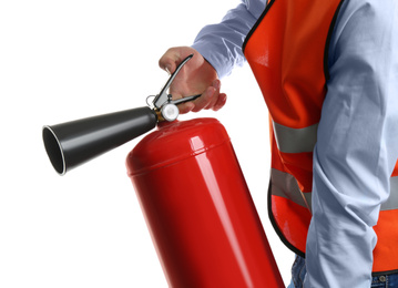 Worker using fire extinguisher on white background, closeup