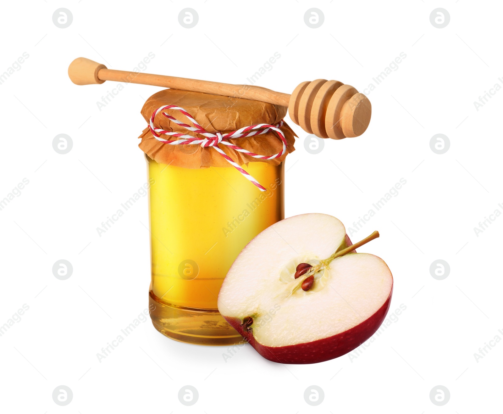 Image of Honey in glass jar, cut apple and dipper isolated on white