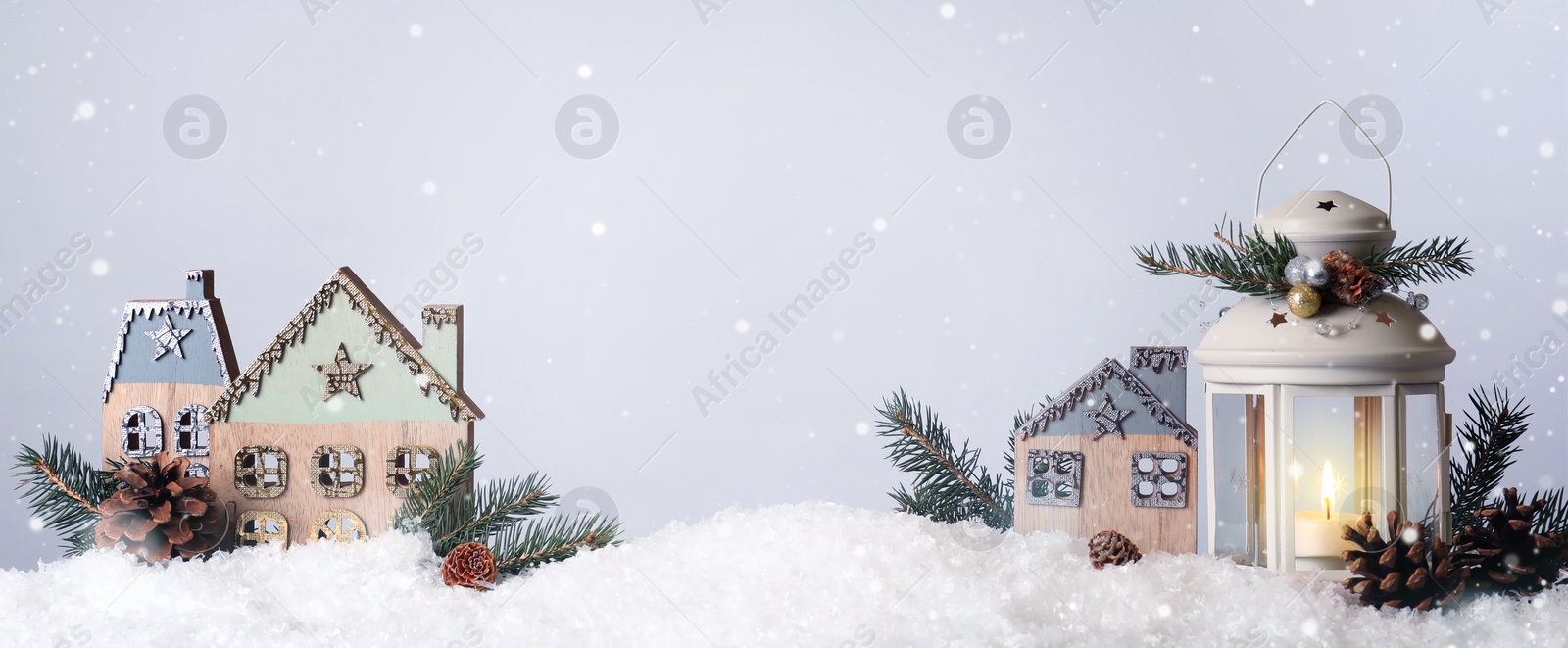 Image of Beautiful composition with vintage Christmas lantern and festive decorations on snow against white background, space for text. Banner design 