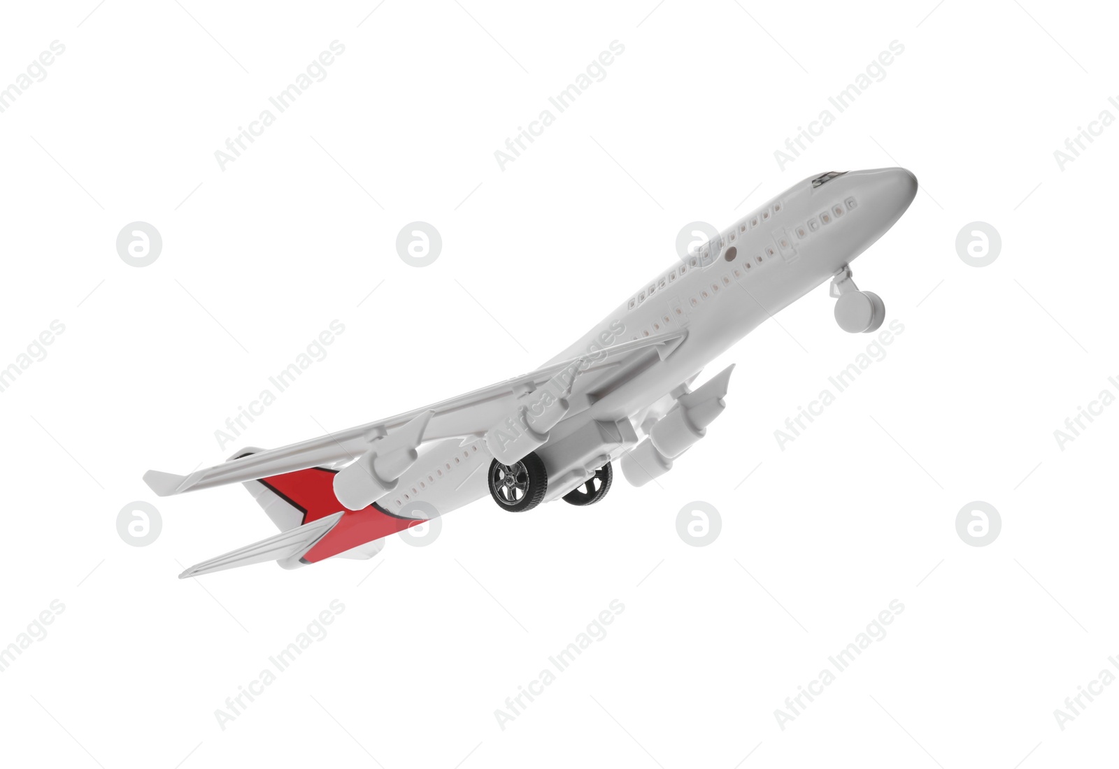 Photo of Toy airplane isolated on white. Travel concept