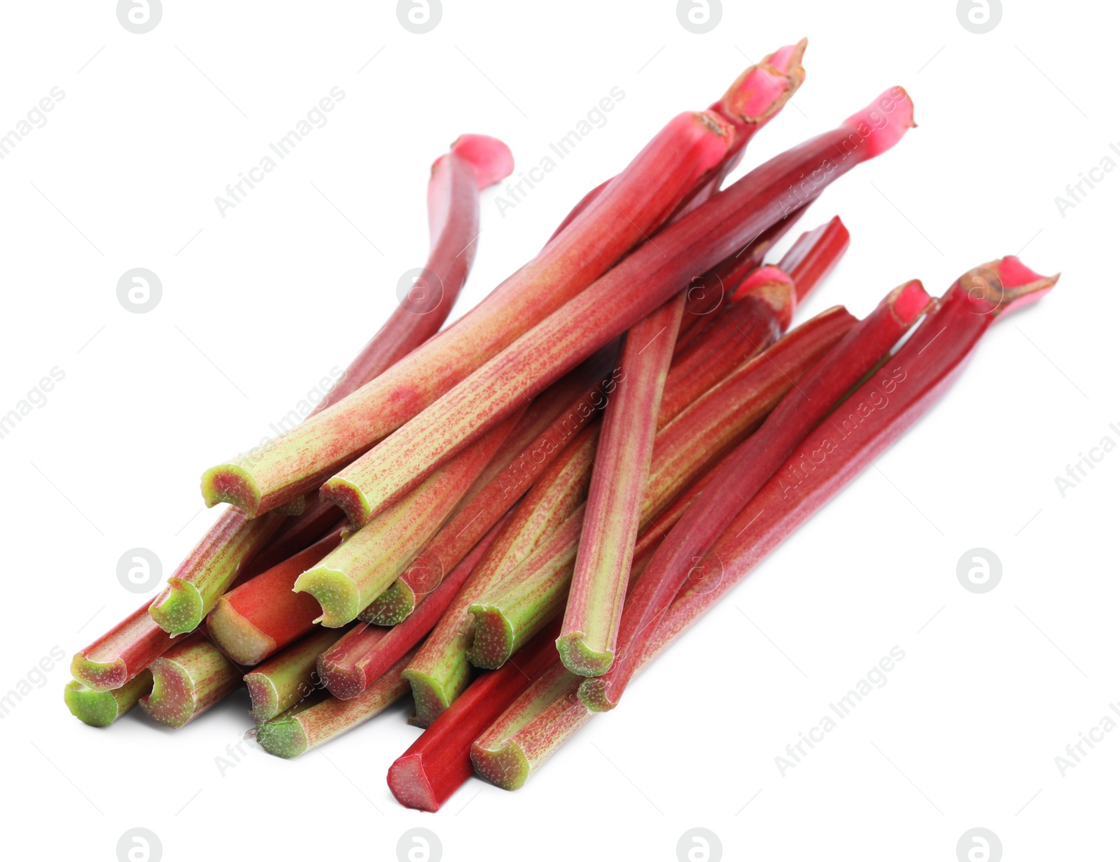 Photo of Heap of fresh rhubarb stalks isolated on white