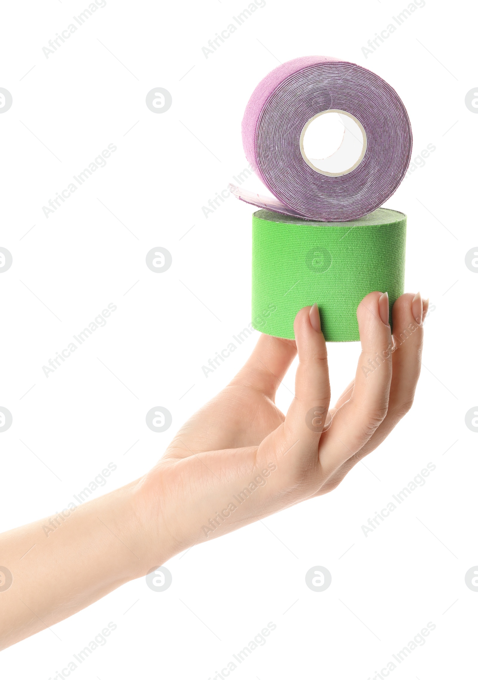 Photo of Woman with bright kinesio tape in rolls on white background, closeup