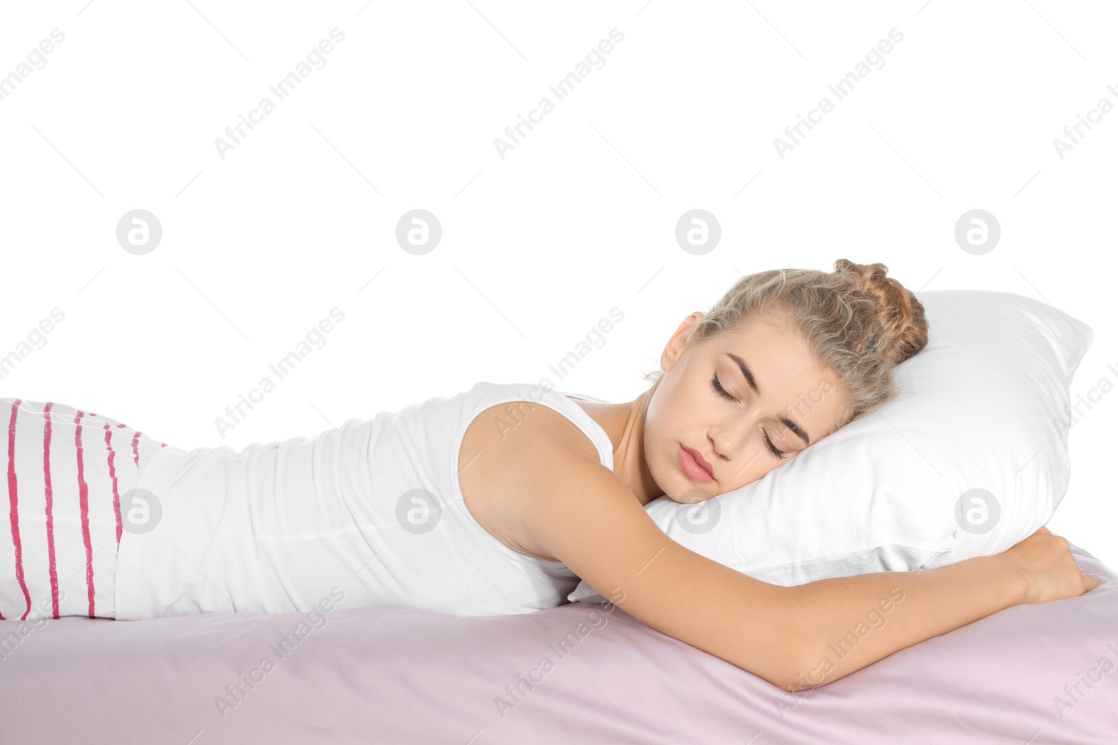 Photo of Beautiful woman sleeping with comfortable pillow on bed against white background