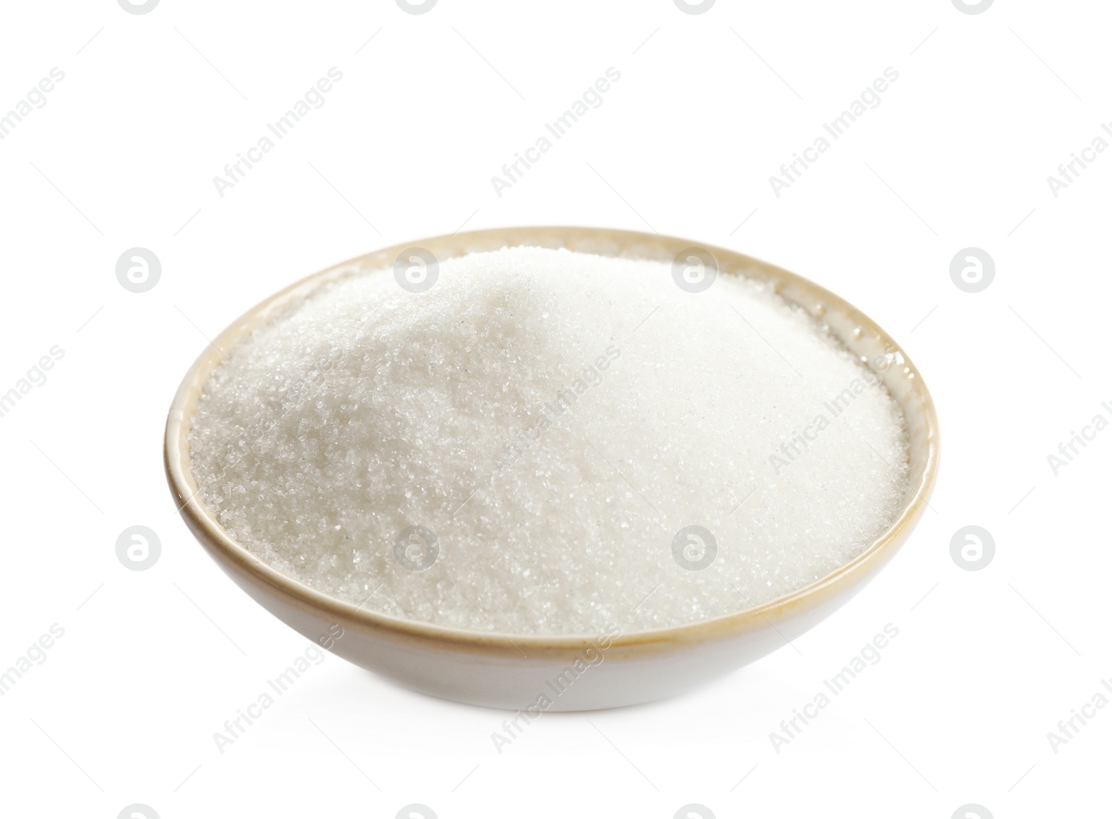 Photo of Granulated sugar in bowl isolated on white