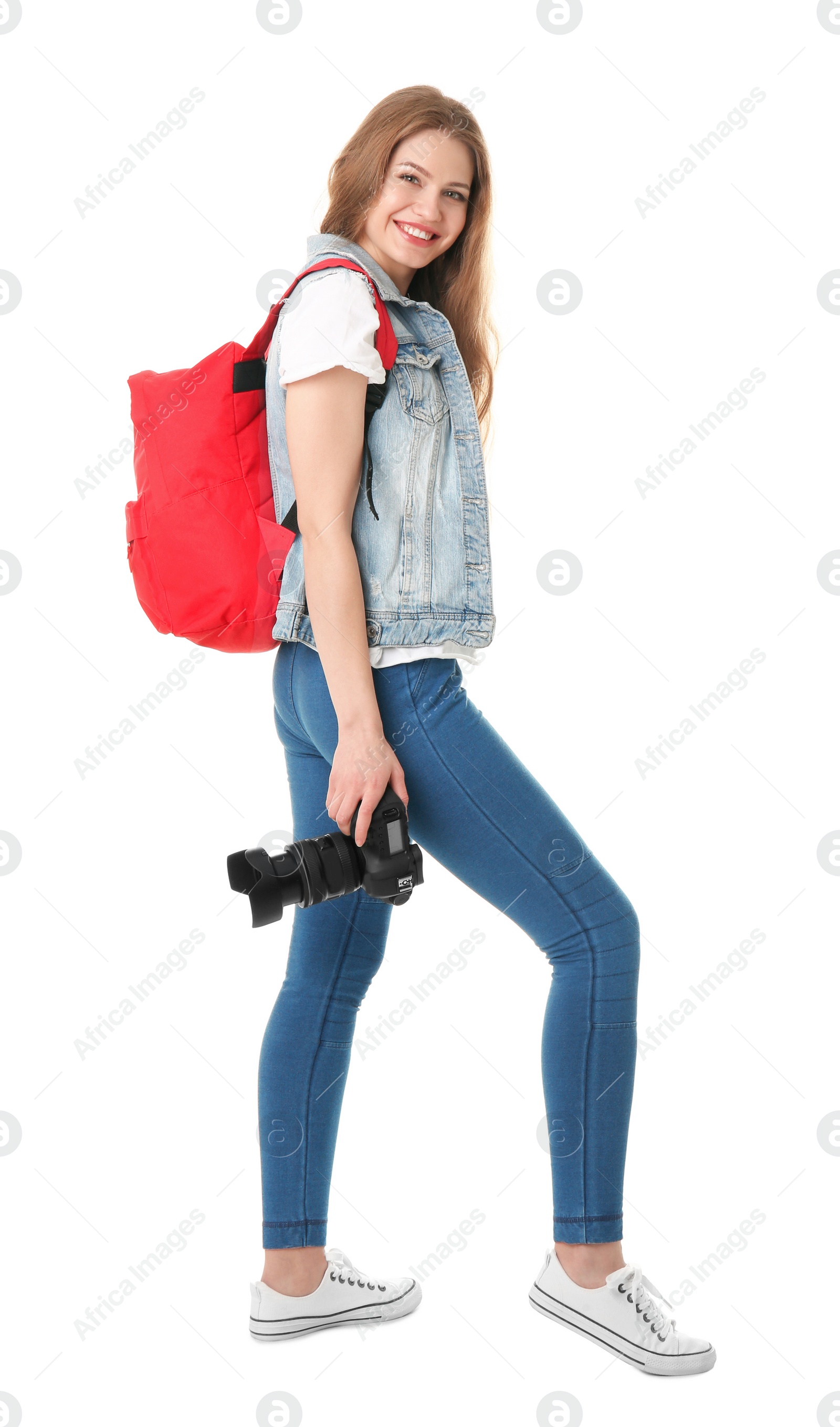 Photo of Female photographer with camera on white background