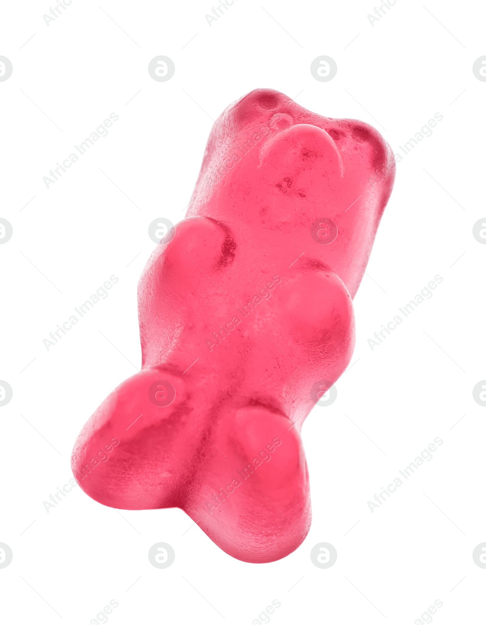 Photo of Delicious pink jelly bear on white background