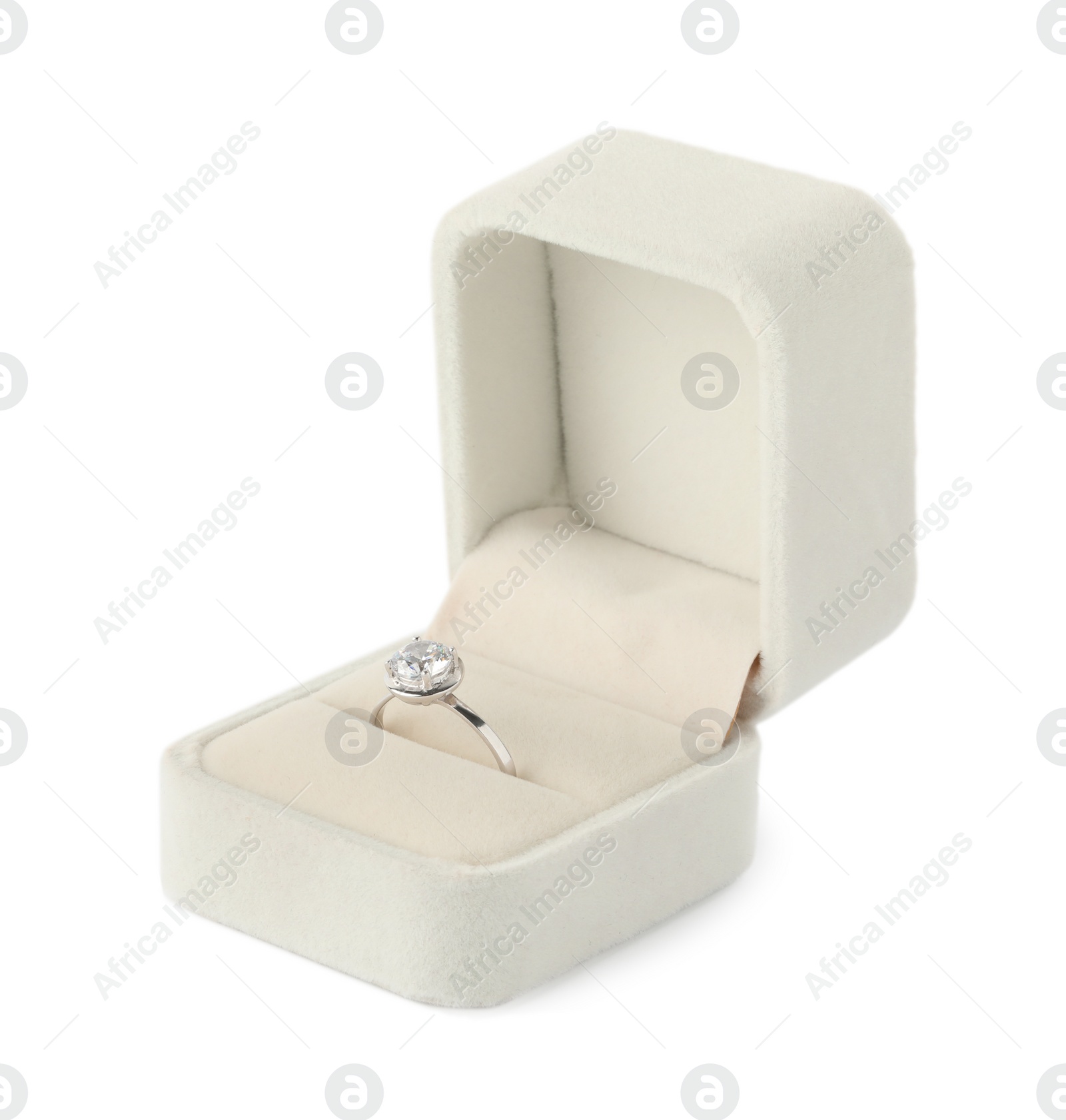 Photo of Beautiful engagement ring with gemstone in box isolated on white