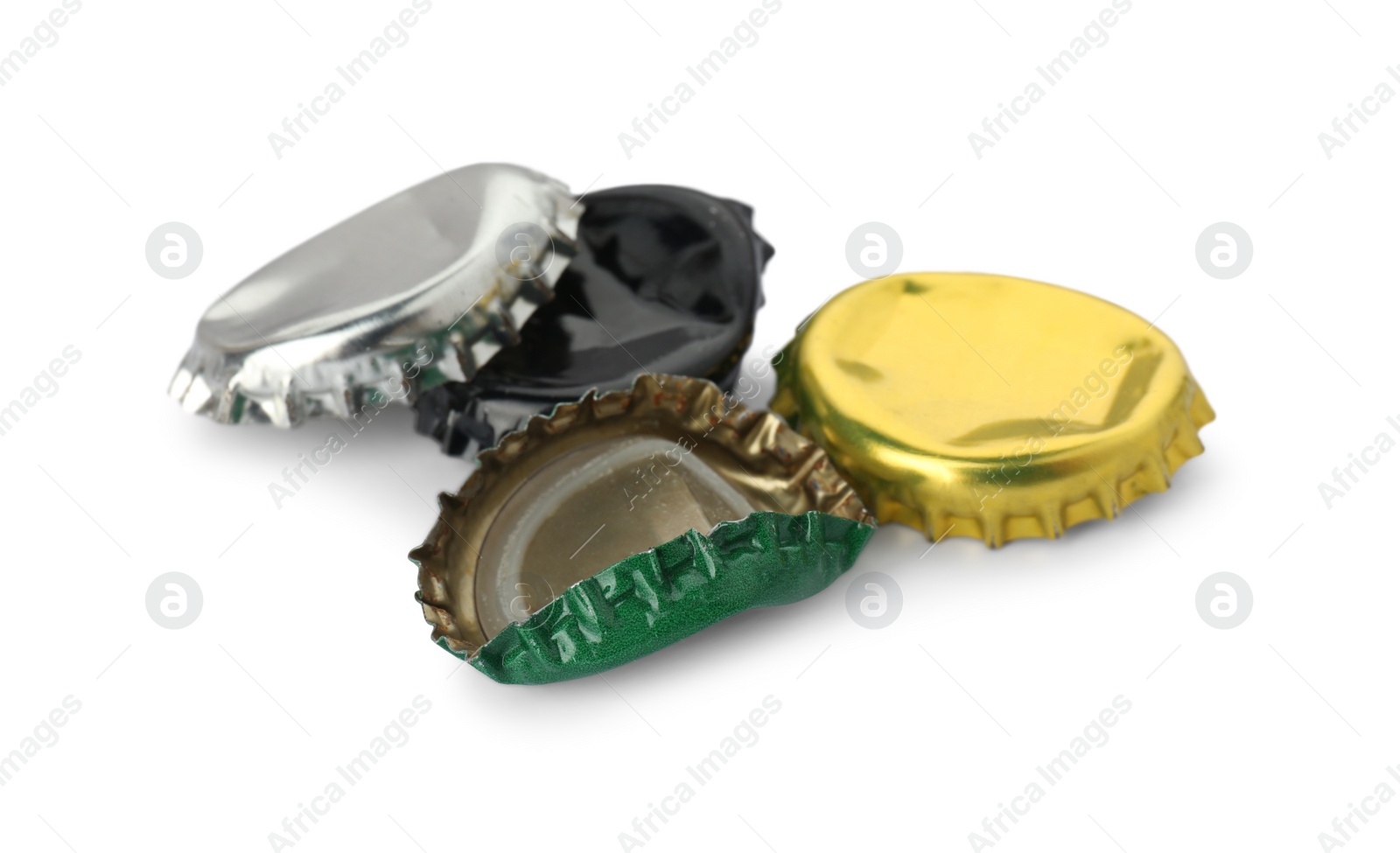 Photo of Group of different beer bottle caps isolated on white