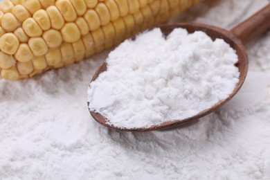 Photo of White corn starch and cob on powder, closeup