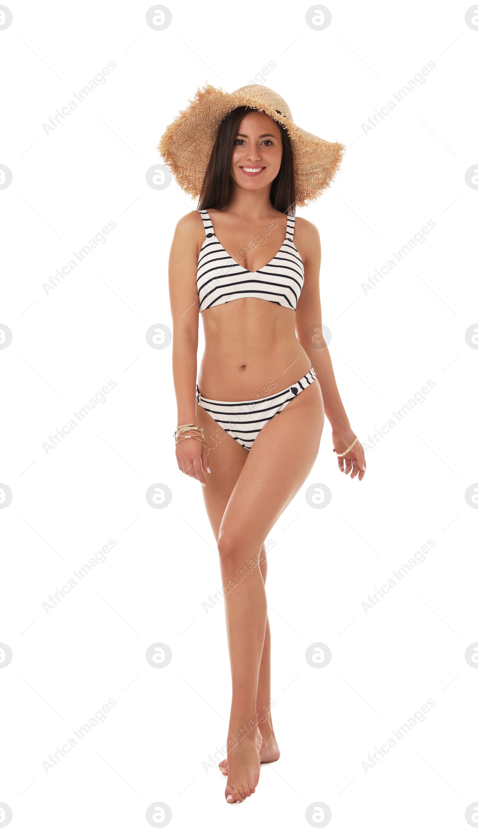 Photo of Pretty sexy woman with slim body in stylish striped bikini on white background