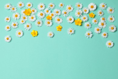Photo of Many beautiful flowers on light blue background, flat lay. Space for text