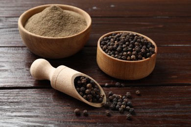 Photo of Aromatic spice. Ground and whole black pepper on wooden table