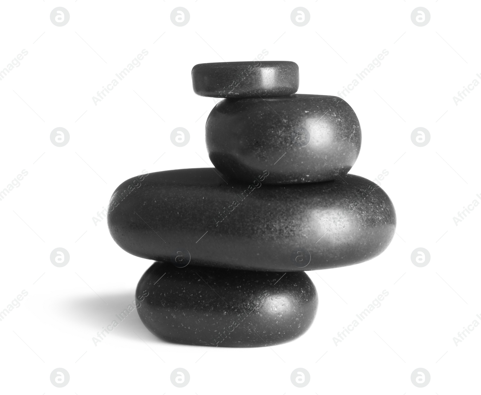 Photo of Stack of zen spa stones on white background