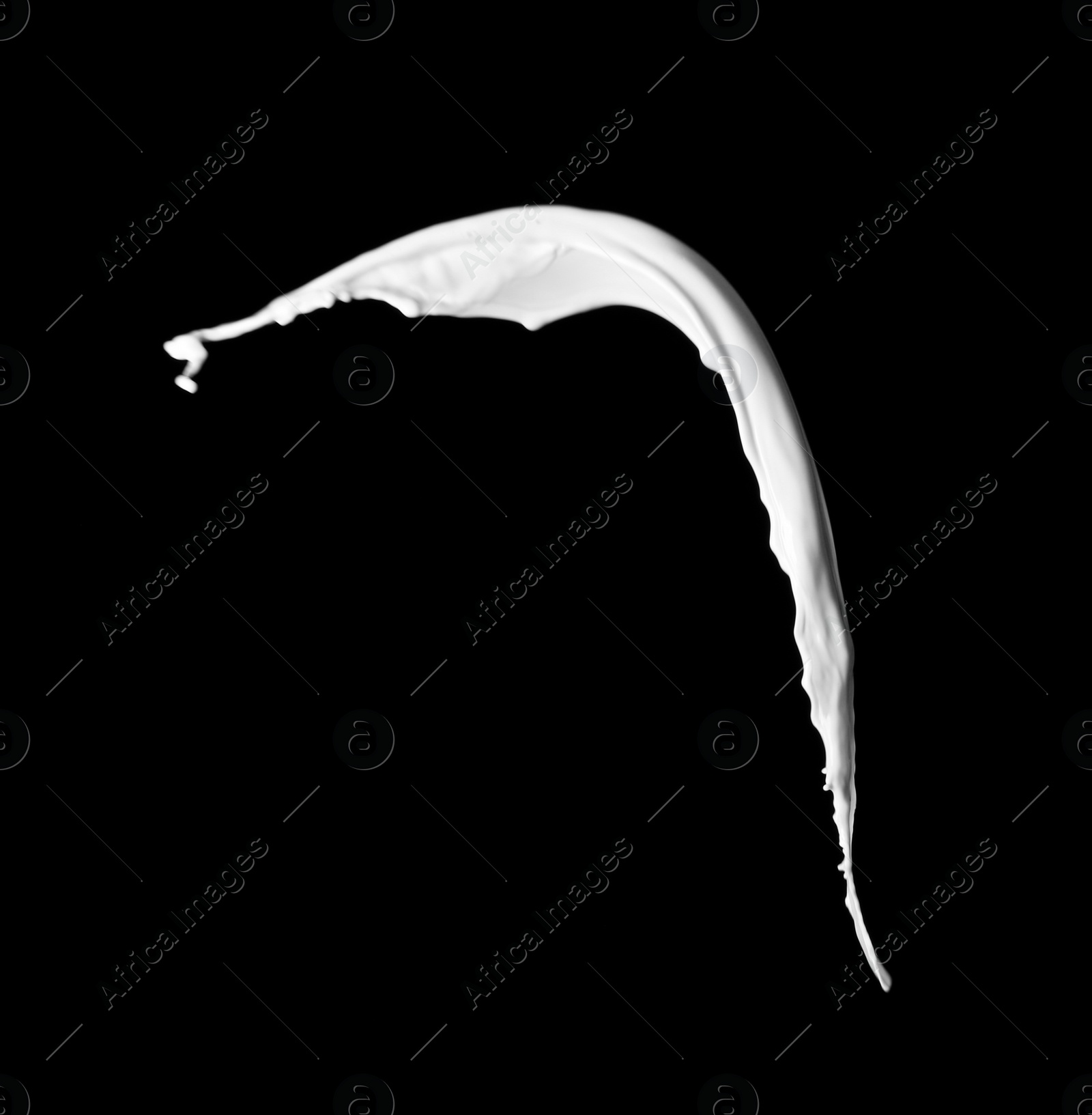 Photo of Splash of fresh milk on black background