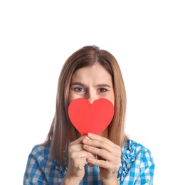 Portrait of woman with paper heart on white background