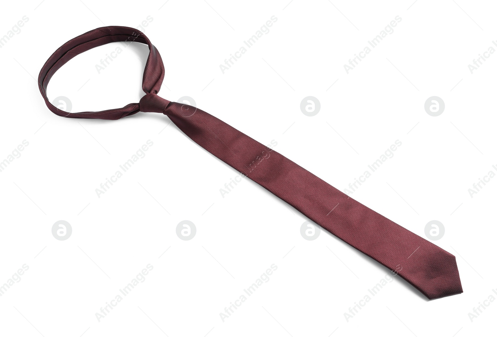 Photo of One brown necktie isolated on white, above view