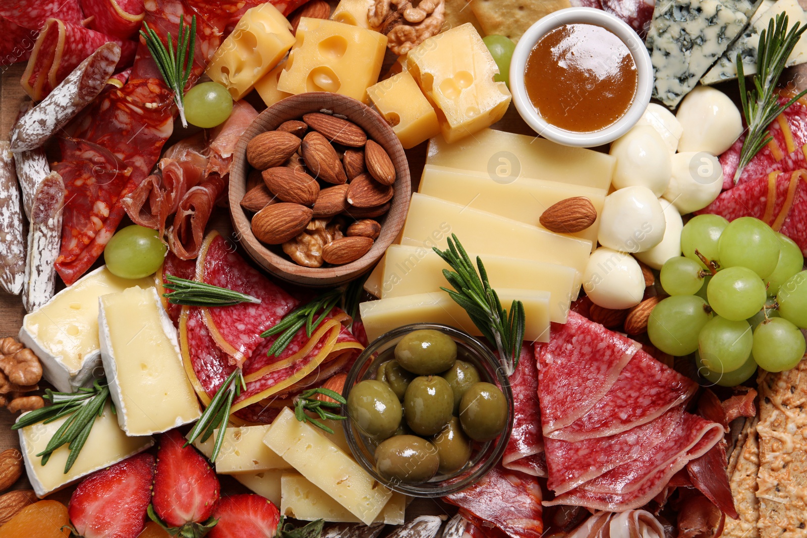 Photo of Tasty assorted appetizers as background, top view
