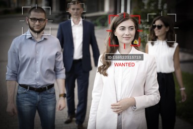 Facial recognition system identifying people on city street. AI giving personal data of woman