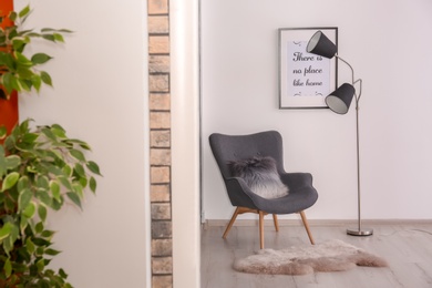 Photo of Stylish room interior, view through open door